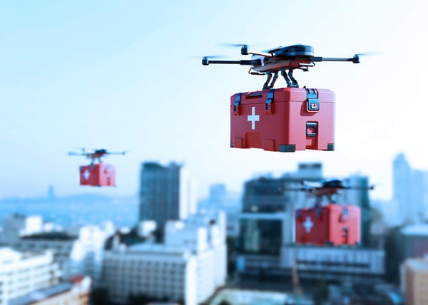 Drones carrying medical supplies flying in city