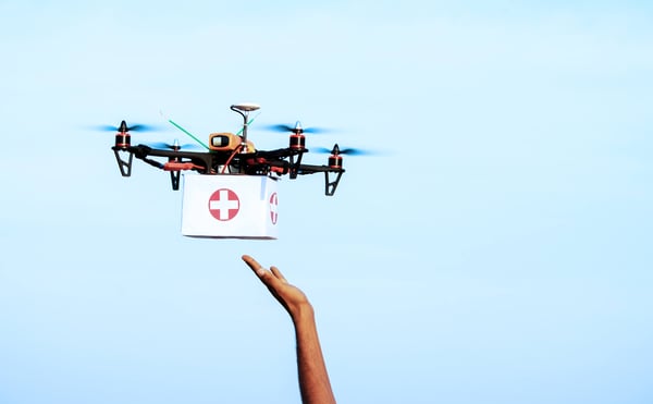 Small drone carrying medical delivery